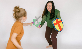 Angela playing with girl